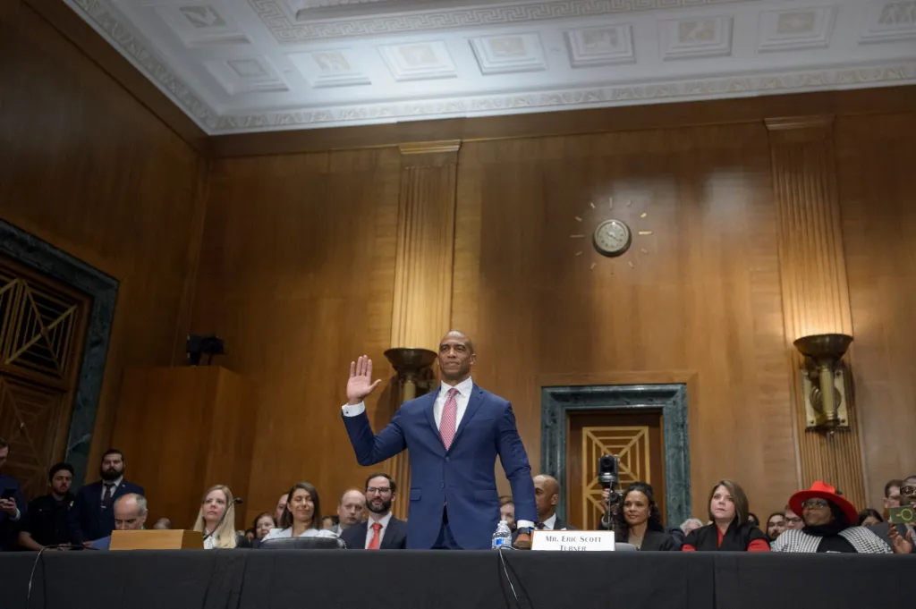 Eric Scott Turner, President-elect Donald Trump’s nominee to be Secretary of Housing and Urban Development, is sworn-in during a Senate Committee on Banking, Housing, and Urban Affairs hearing for his pending confirmation on Capitol Hill, Thursday, Jan. 16, 2025, in Washington. (AP Photo/Rod Lamkey, Jr.)